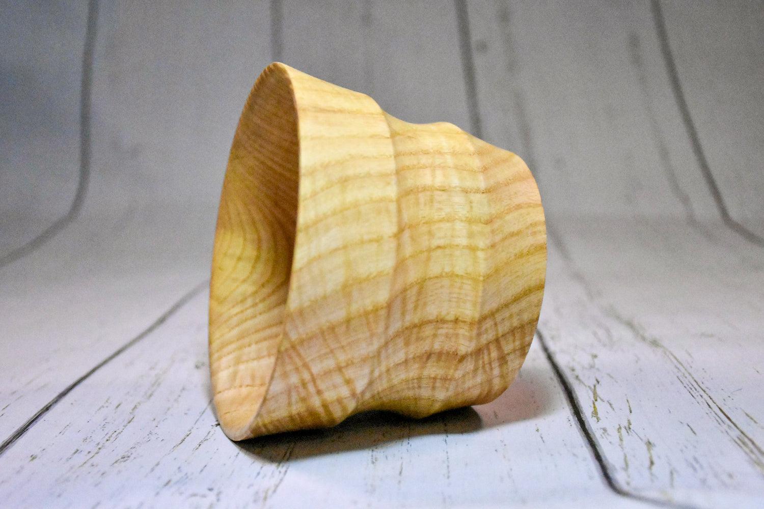 A hand-turned bowl laying on its side